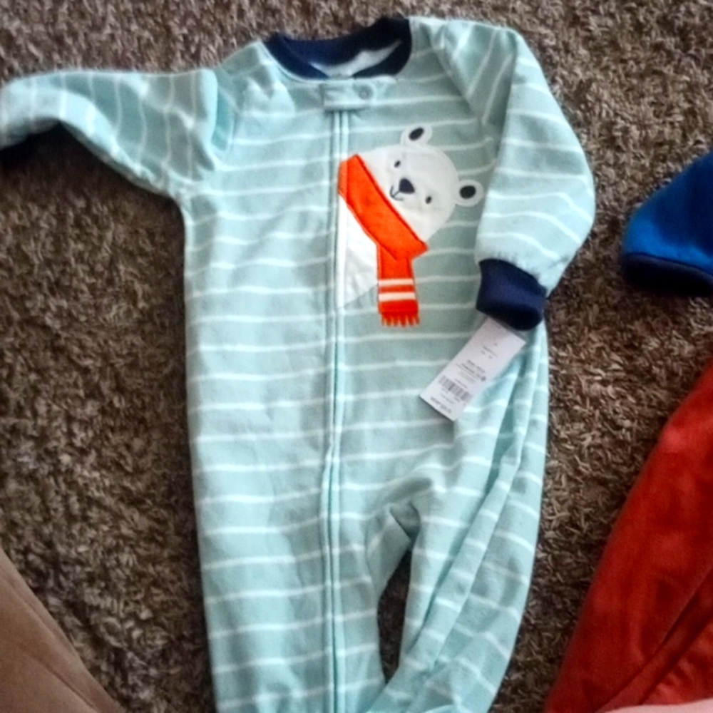 2 Carter Onesie 24 brand new tags and a Carter's Jacket with tags